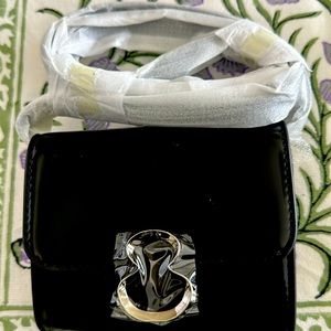 Brand new wallet on chain.  Full set with dustbag.